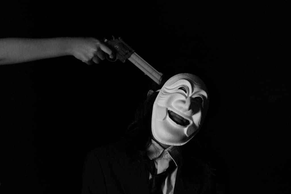 anonymous-black-and-white-blackmailing